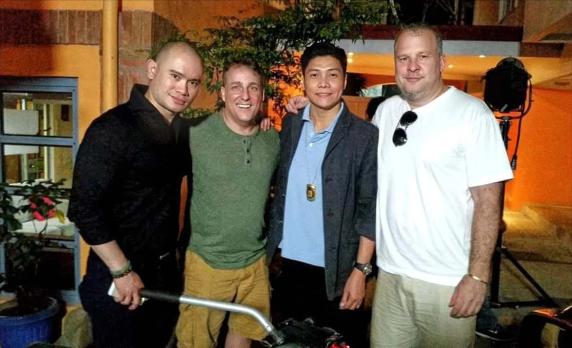 Gregory Segal with three colleagues at night