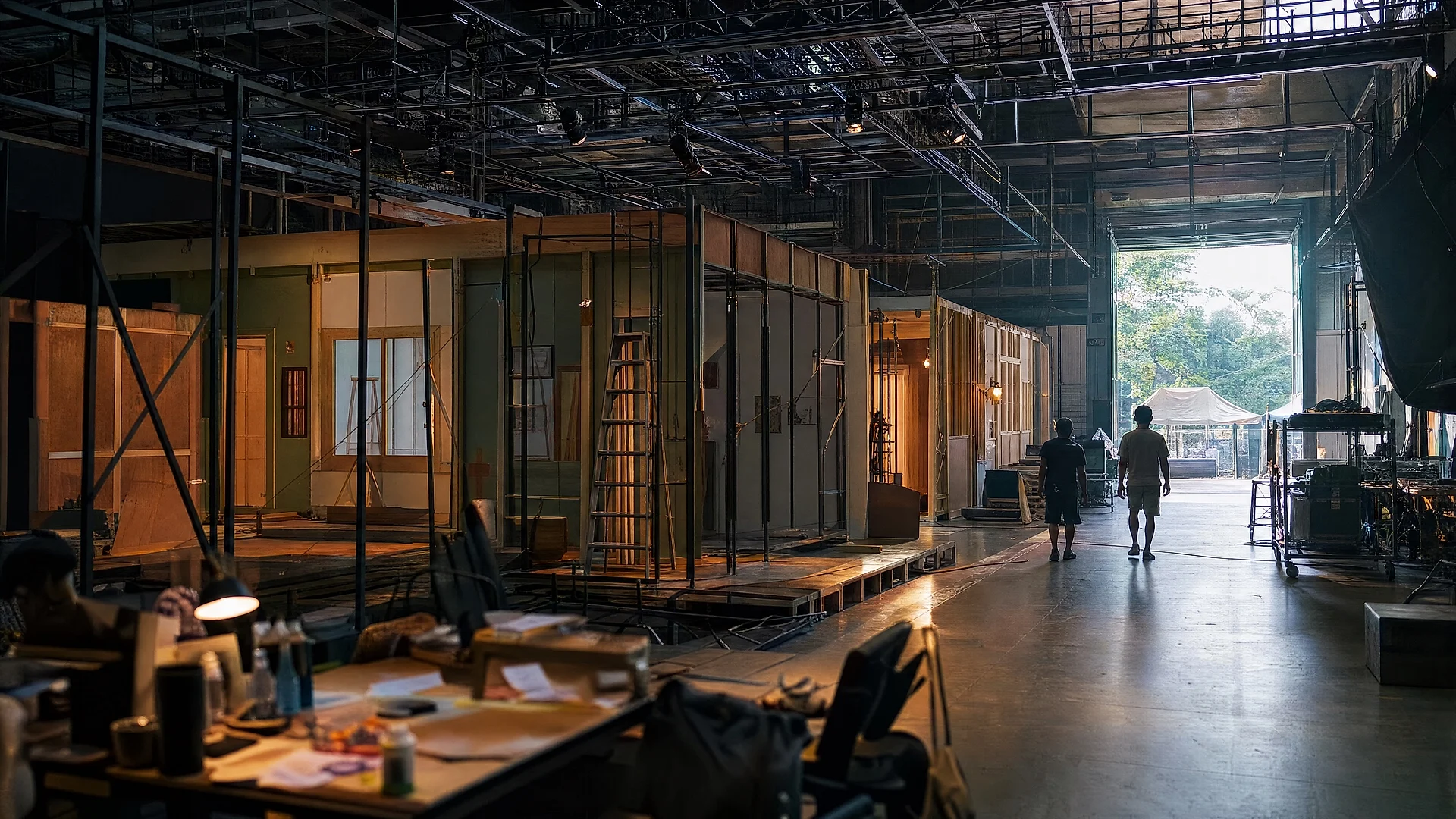 A soundstage in Thailand mid-build, lighting grid overhead